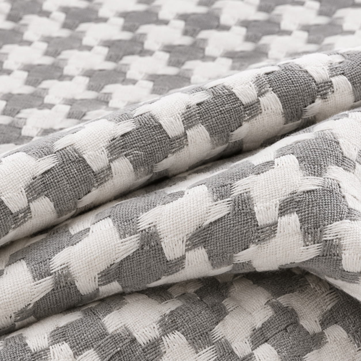 Detalhe do padrão geométrico jacquard da Colcha BellaTonka — BellaGoma